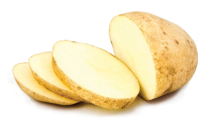 sliced raw potato isolated on white background with copyspace